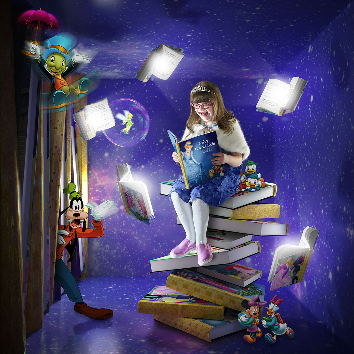 Young girl reading Disney books