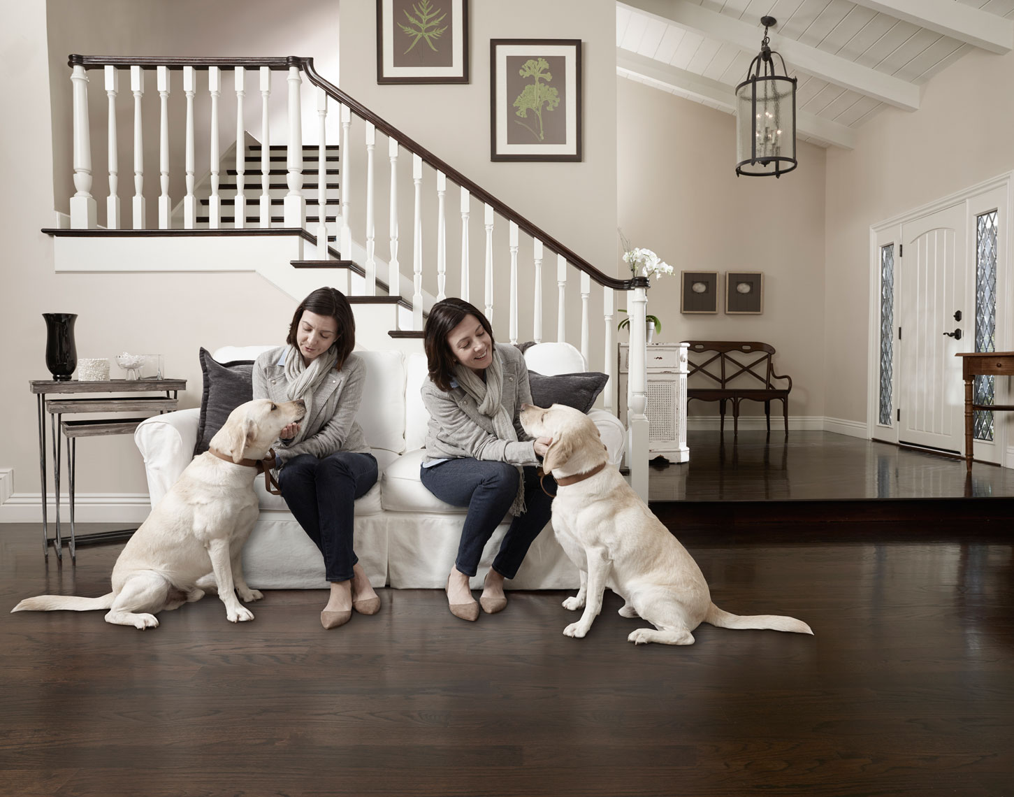 Young twin women with dogs
